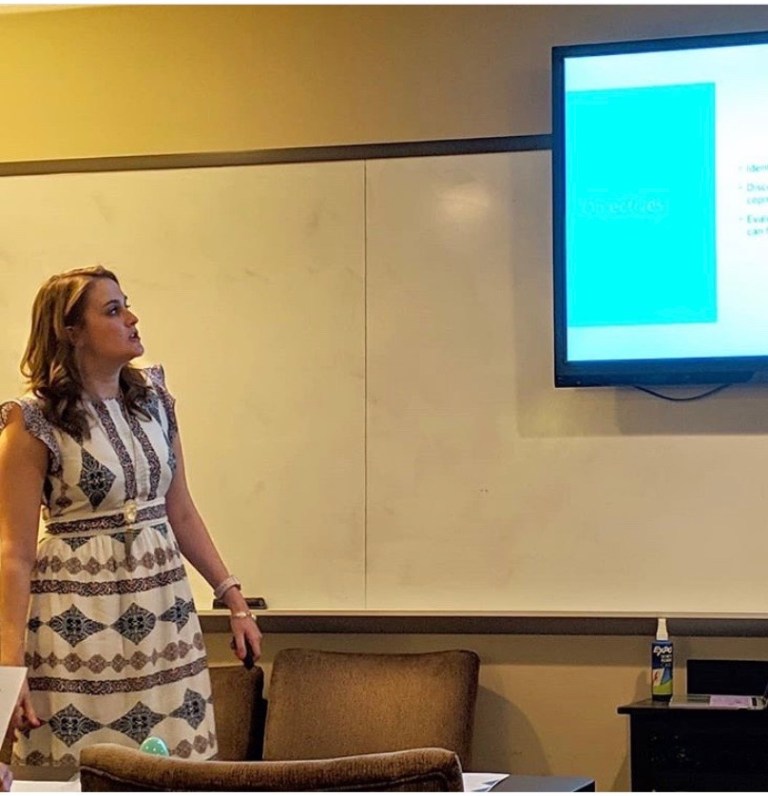 Bryna Talamantez speaking at the Therapy Hive CEU event